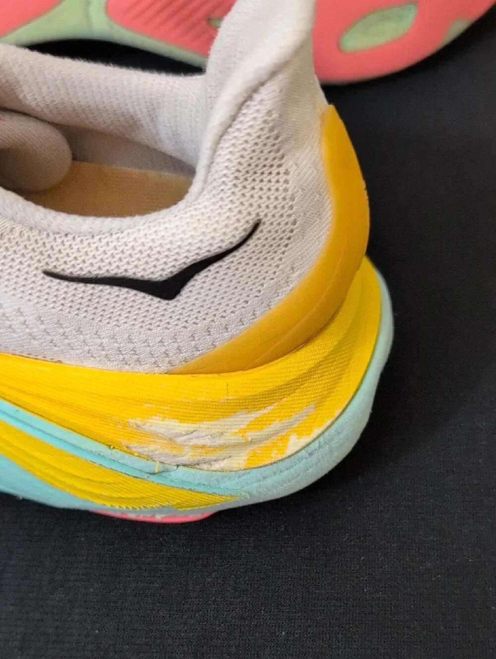 Hoka white blue shoe interior label